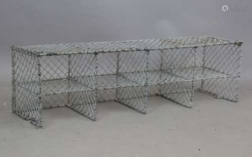 A mid-20th century wirework eight-division shoe rack, height...