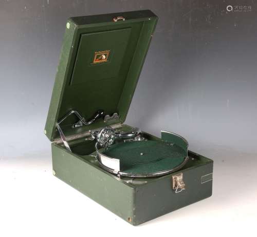 An HMV green cased portable gramophone, model No. 102C, fitt...