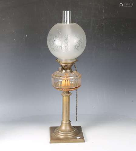 An early 20th century cut glass and brass table oil lamp wit...