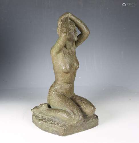 An early/mid-20th century green patinated plaster figure of ...