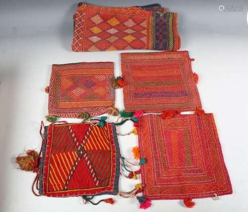 A group of Indian embroidered textiles, including a large sq...