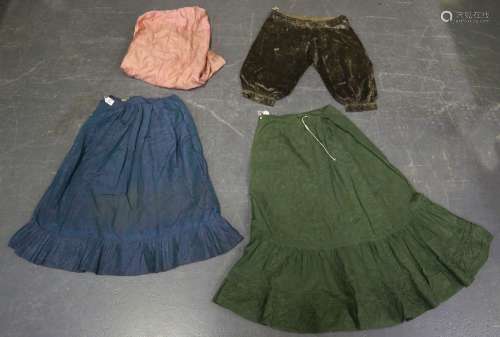 A group of Victorian undergarments, including a blue shot si...