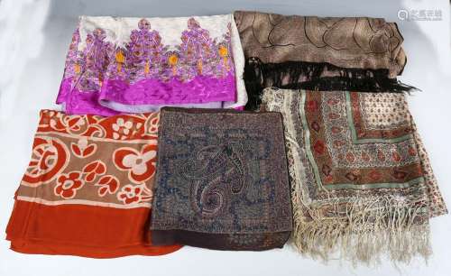 A group of Indian shawls, including a fine cotton shawl prin...
