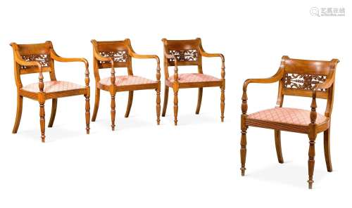 A SET OF FOUR ANGLO-INDIAN CARVED EXOTIC HARDWOOD ARMCHAIRS,...