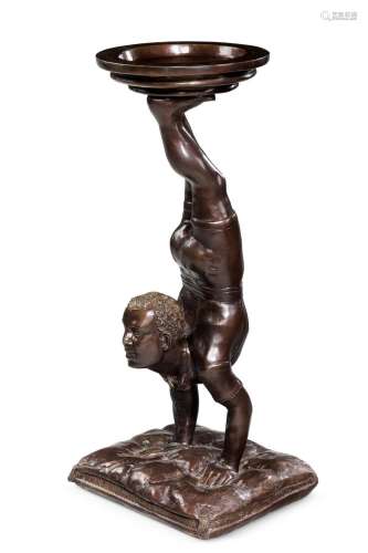 A BRONZE HALL VIDE POCHE TABLE IN THE FORM OF AN ACROBAT, 20...