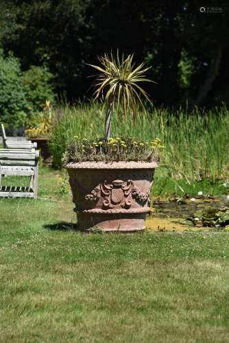 A PAIR OF LARGE TERRACOTTA URNS PLANTED WITH SMALL PALMS, MO...