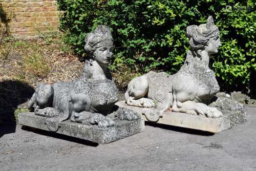 A PAIR OF COMPOSITION STONE SPHINXES, AFTER COADE, MODERN