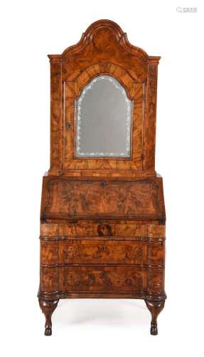 A NORTH ITALIAN FIGURED WALNUT AND CROSSBANDED BUREAU CABINE...