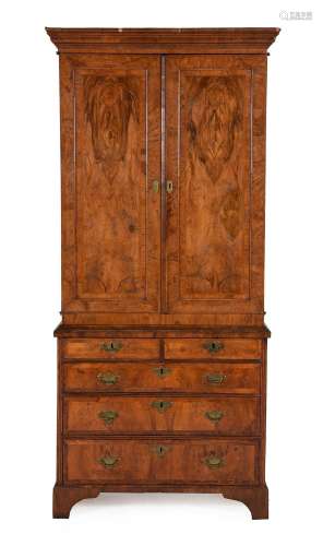 A GEORGE II WALNUT AND FEATHER BANDED CABINET ON CHEST, CIRC...