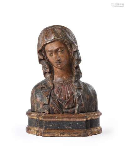 A CONTINENTAL CARVED AND POLYCHROME DECORATED BUST OF THE MA...