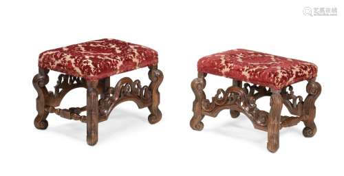 A PAIR OF CARVED WALNUT STOOLS, IN 17TH CENTURY CAROLEAN STY...