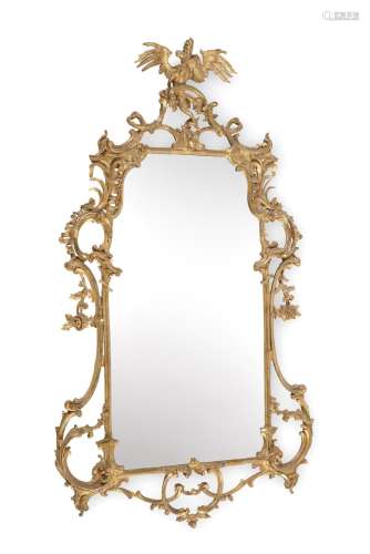 A GEORGE III GILTWOOD WALL MIRROR, IN THE MANNER OF THOMAS J...