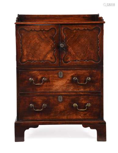 A GEORGE III MAHOGANY NIGHT COMMODE, IN THE MANNER OF THOMAS...