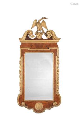 A WALNUT AND PARCEL GILT WALL MIRROR, IN GEORGE II STYLE, 20...