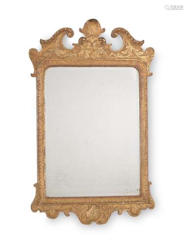 A GEORGE II GILTWOOD AND GESSO WALL MIRROR, CIRCA 1735