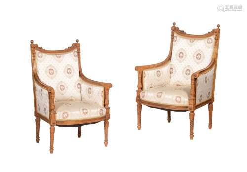 A PAIR OF FRENCH CARVED BEECH ARMCHAIRS, IN LOUIS XVI STYLE,...