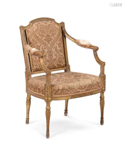 A GEORGE III CARVED GILTWOOD AND UPHOLSTERD OPEN ARMCHAIR, C...