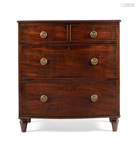 A GEORGE III MAHOGANY BOWFRONT CHEST OF DRAWERS, CIRCA 1810