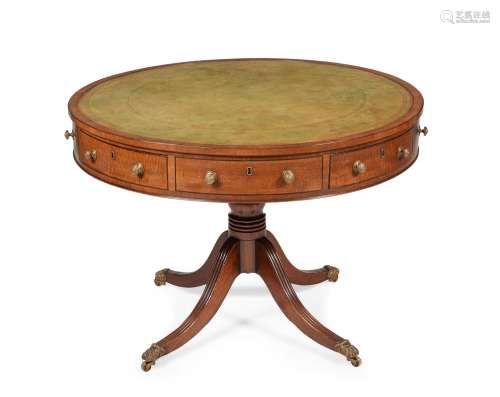 A GEORGE III MAHOGANY DRUM LIBRARY TABLE, CIRCA 1790