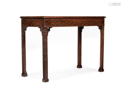 A CARVED MAHOGANY SIDE TABLE, IN THE MANNER OF THOMAS CHIPPE...