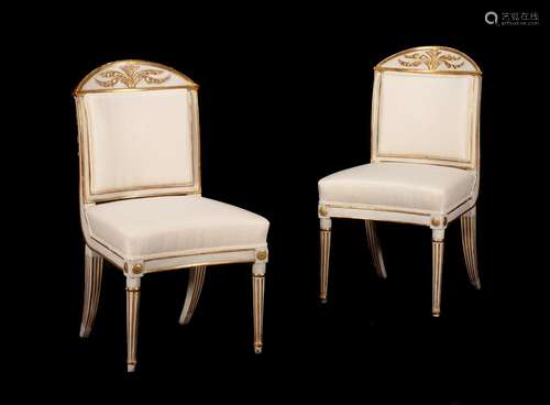 A PAIR OF SCANDINAVIAN CREAM PAINTED AND PARCEL GILT SIDE CH...