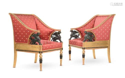 A PAIR OF GILTWOOD AND EBONISED ARMCHAIRS, IN EMPIRE STYLE, ...