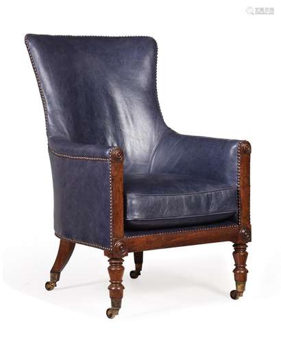 Y A GEORGE IV ROSEWOOD AND LEATHER UPHOLSTERED LIBRARY ARMCH...