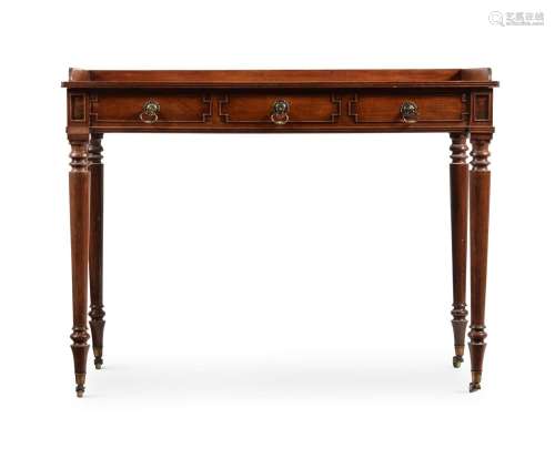 A REGENCY MAHOGANY DRESSING TABLE, IN THE MANNER OF GILLOWS,...
