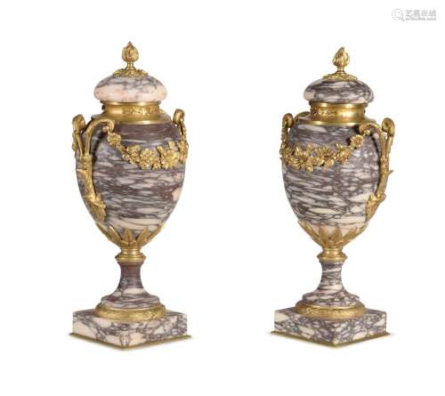 A PAIR OF FRENCH BRECHE VIOLETTE AND ORMOLU MOUNTED LIDDED U...