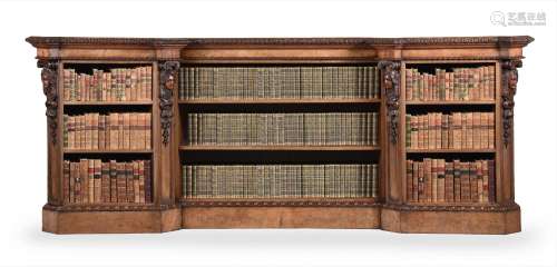A VICTORIAN CARVED WALNUT OPEN BOOKCASE, MID 19TH CENTURY
