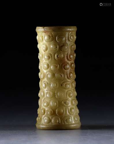 Warring States jade ornament with high relief of spots