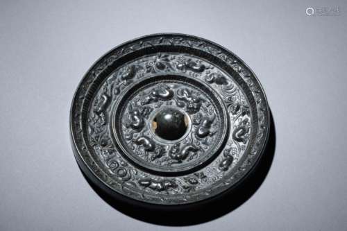 Tang black bronze mirror with relief of animals and birds