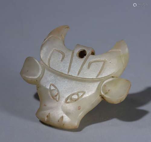 Shang jade bull-head ornament