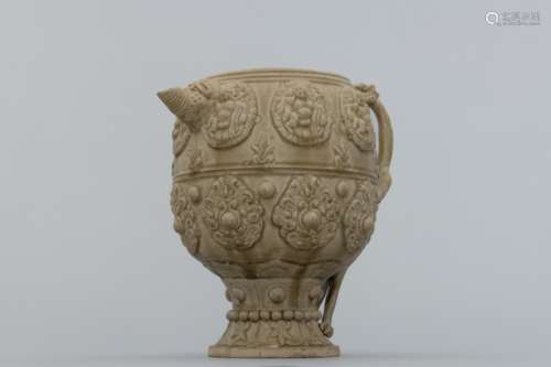 Sui celadon jug with reliefs of monsters