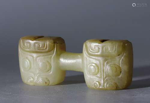 Warring States jade balance-scale with masks