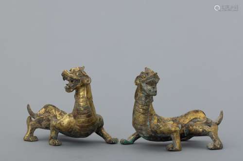Pair of Warring States period gilt bronze monsters