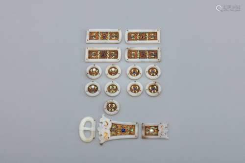 A complete set of Qing gilt silver inlaid Hetian jade panels...