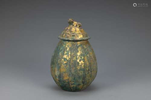 Liao gilt bronze covered container in form of a pumpkin