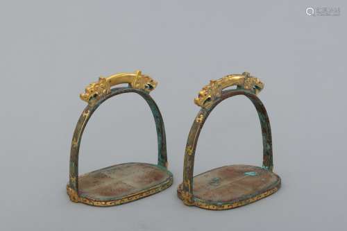 pair of gilt bronze saddle-irons with jade inlaid