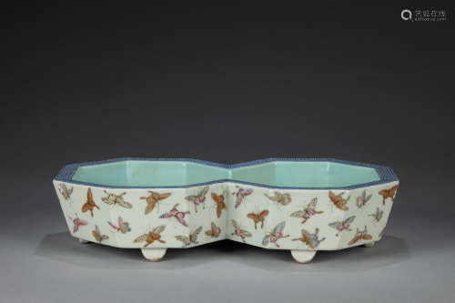pair of Qing Jiaqing connected porcelain pots with butterfli...