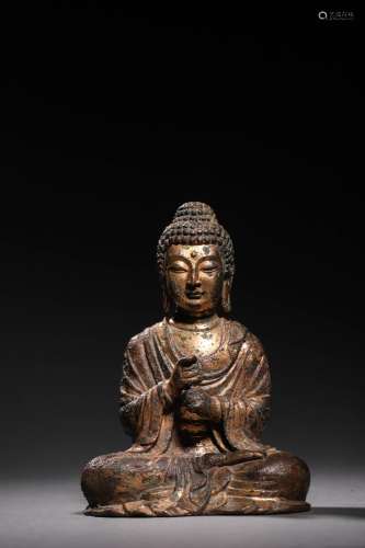 TANG: A GILT BRONZE SEATED BUDDHA STATUE