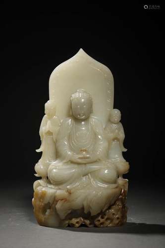 MING: A CARVED WHITE JADE SEATED BUDDHA STATUE