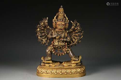 A GILT BRONZE & SILVER TIBETAN DEITY 'DA WEI DE JI