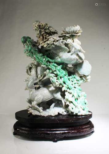 A CARVED NEPHRITE JADE ORNAMENT