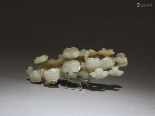 QING DYNASTY: A CARVED JADE JADE GANODERMA SHAPED BRUSH HOLD...