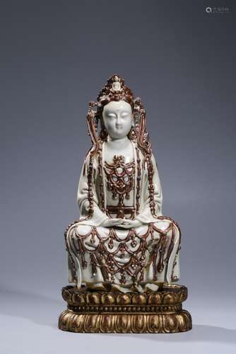 YUAN DYNASTY: AN UNDERGLAZE RED PORCELAIN GUANYIN STATUE