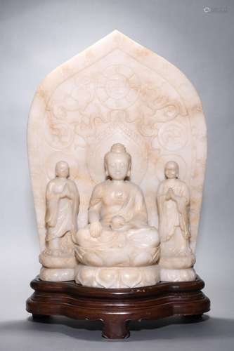 MING: A LARGE CARVED JADE BUDDHA WITH TWO DISCIPLES ORNAMENT