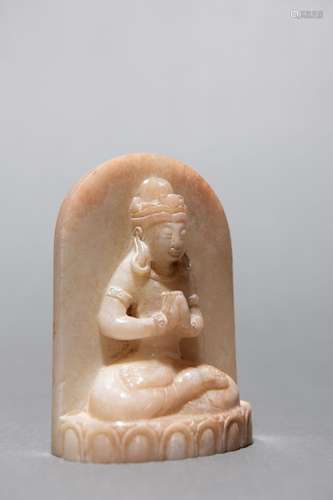 YUAN: A CARVED JADE OF THE BUDDHA FIGURINE