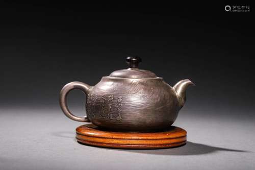 QING: A SILVER TEAPOT