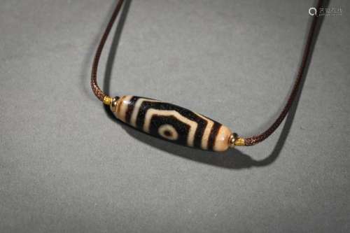 A THREE EYE DZI BEAD